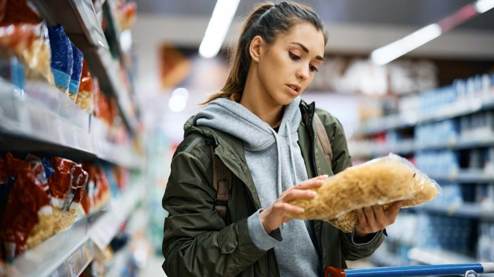 Woman buying pasta 