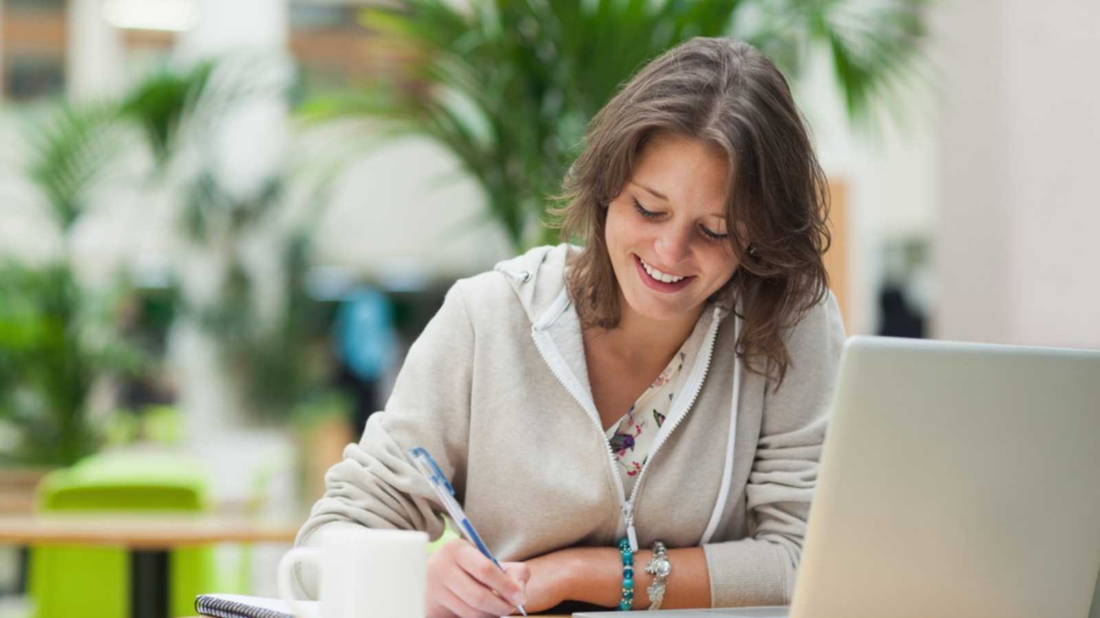 Woman writing down